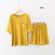 Phụ nữ mùa hè mới 2020 Tencel cotton ngắn tay quần đùi phù hợp với màu tinh khiết đơn giản thường phục vụ tại nhà - Nam giới