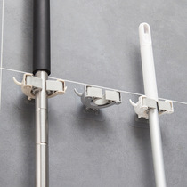 Non-punching buckle mop hanger mop rack toilet wall-mounted powerful adhesive wall mop clip hanger sweep the deviner