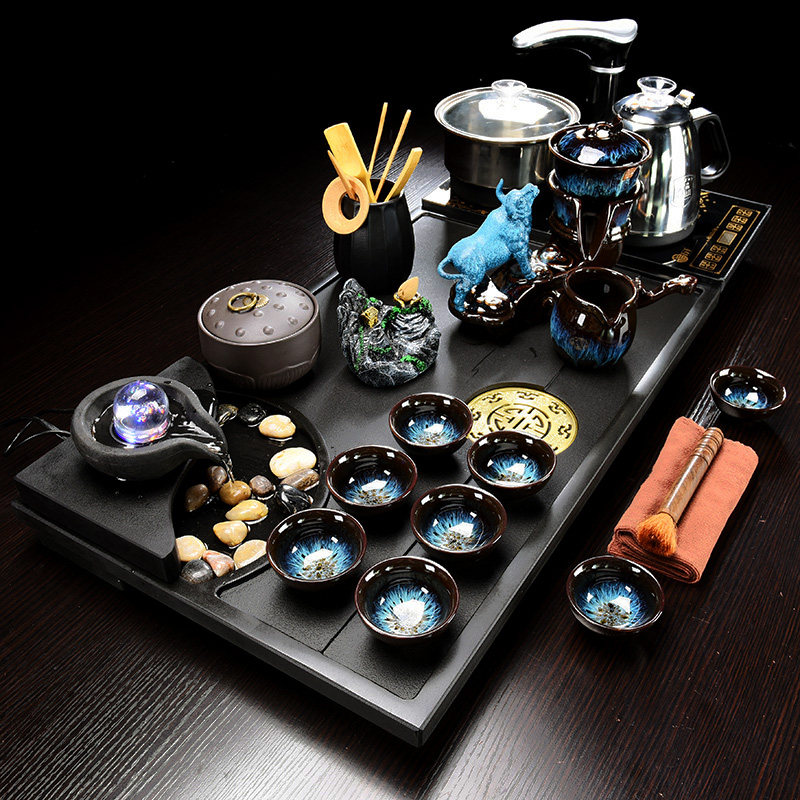 Tea set household whole piece of Ukraine pipeline tea plate Kung fu large tea table ceramic purple stone tea sea