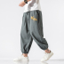 Linen quần của nam giới mùa hè sweatpants lỏng xà cạp gió Trung Quốc thêu bông quần chín điểm xu hướng lớn mã 