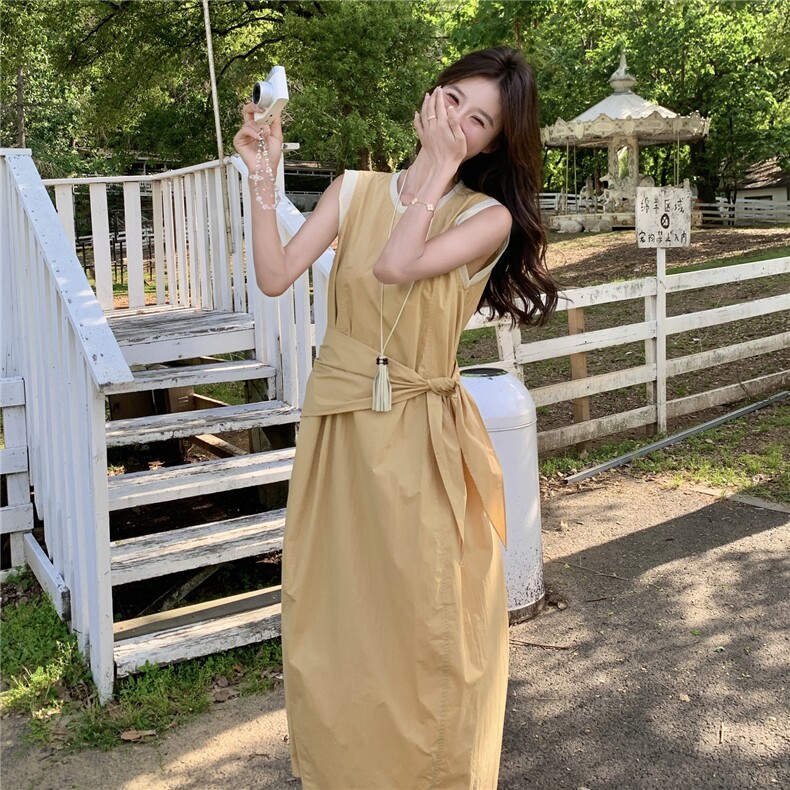 黄色气质无袖背心连衣裙女夏季2025新款法式超好看掐腰a字大摆裙图片