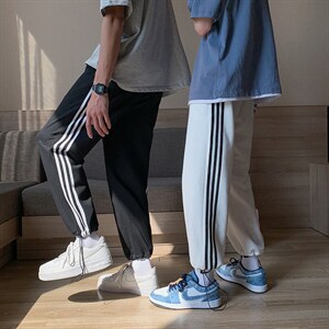 K2026-P40秋装男女情侣大码三条杠宽松抽绳束脚运动休闲卫裤控58图片