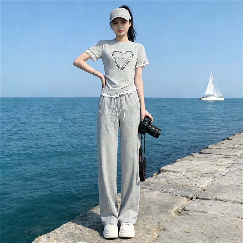 个性潮流时尚套装女夏季新款钉珠蕾丝花边设计短袖阔腿长裤两件套图片