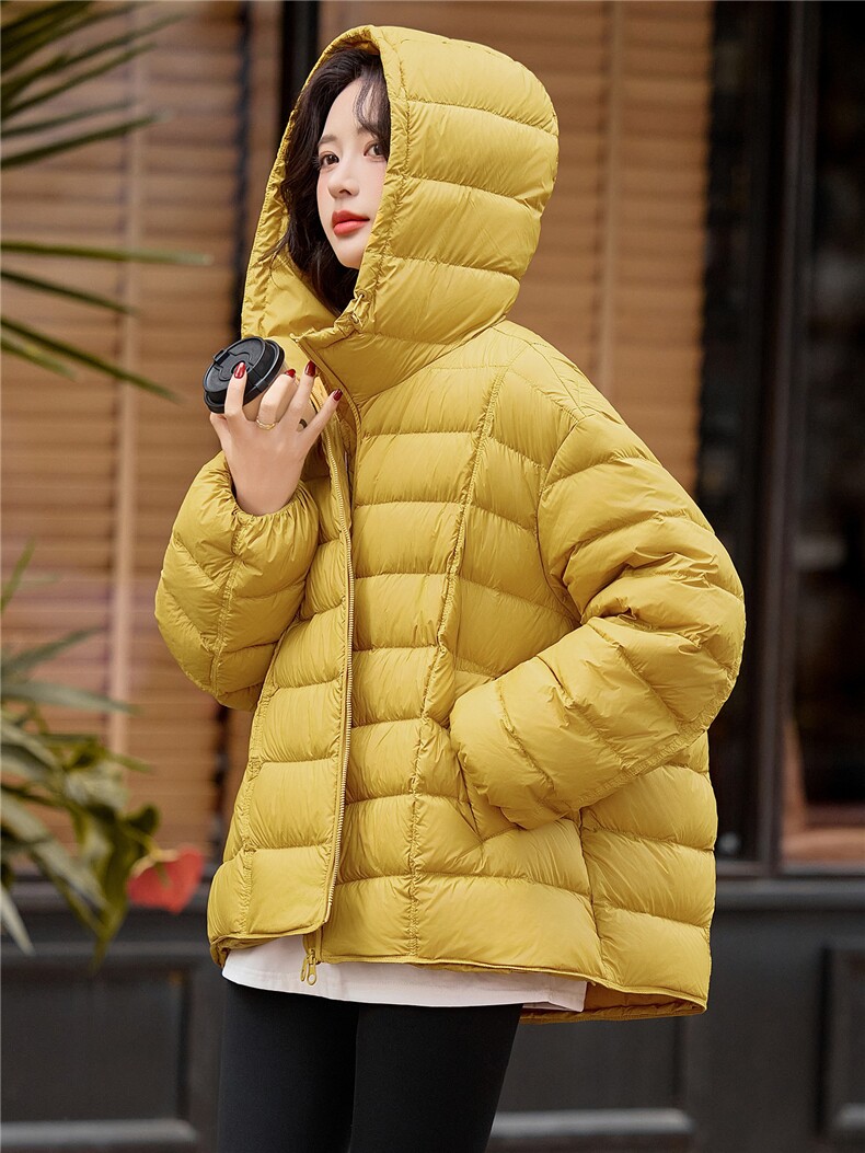 现货新款黄色排骨款泡芙白鸭绒羽绒服女宽松连帽加厚冬装外套,女装羽绒服,梦懿尔
