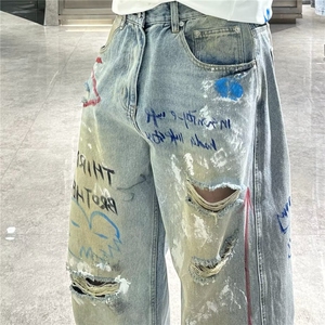 潮牌春夏重工牛仔裤男潮手绘涂鸦做旧破洞宽松青年痞帅阔腿裤潮图片