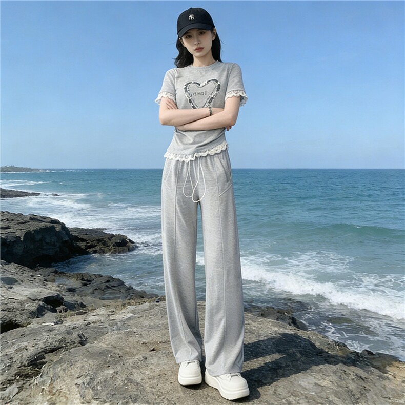 韩版时尚气质套装女夏季新款高级感显瘦短袖上衣宽松阔腿裤两件套图片