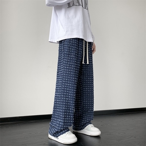 703-K323-P55 秋季牛仔破洞工艺休闲微喇长裤 包边包条图片