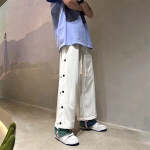男春季潮流时尚休闲长裤排扣裤D320P37图片