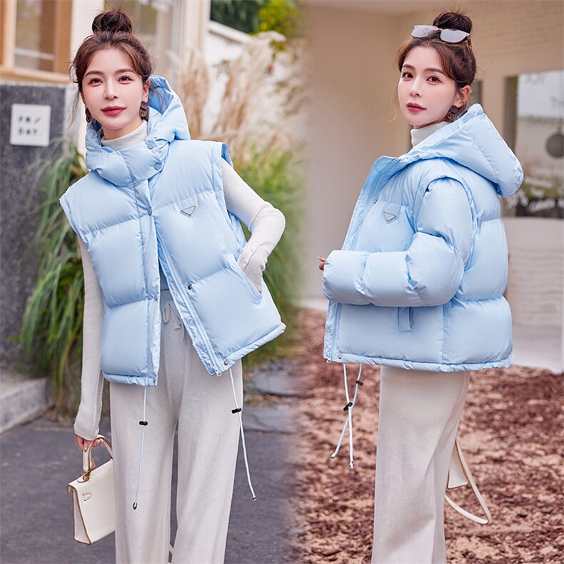 现货2023韩版可拆袖两穿连帽羽绒服三角标保暖网红白鸭绒厚女外套图片