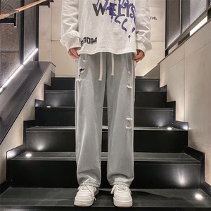 新款时尚潮男百搭宽松破洞牛仔裤图片