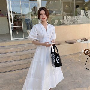 2021夏季新款女装中长款连衣裙简约时尚A字裙V领短袖图片