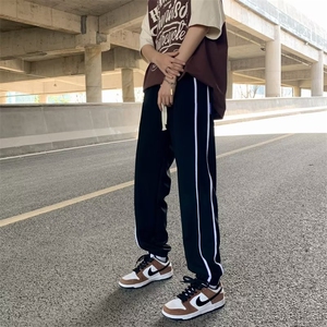 长裤运动裤水洗宽松型青春流行休闲裤时尚潮牌纽扣装饰潮夏季男图片
