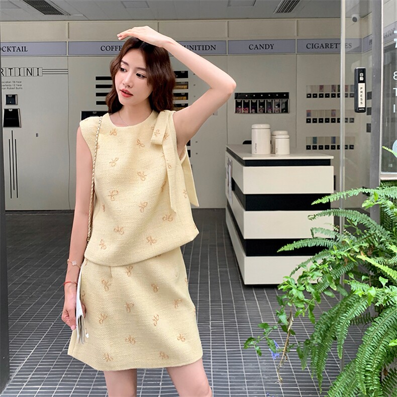韩版气质小香风蝴蝶结套装女2025夏季新款背心上衣半身短裙两件套图片