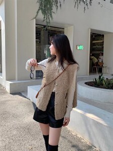 皮毛一体毛边马甲图片