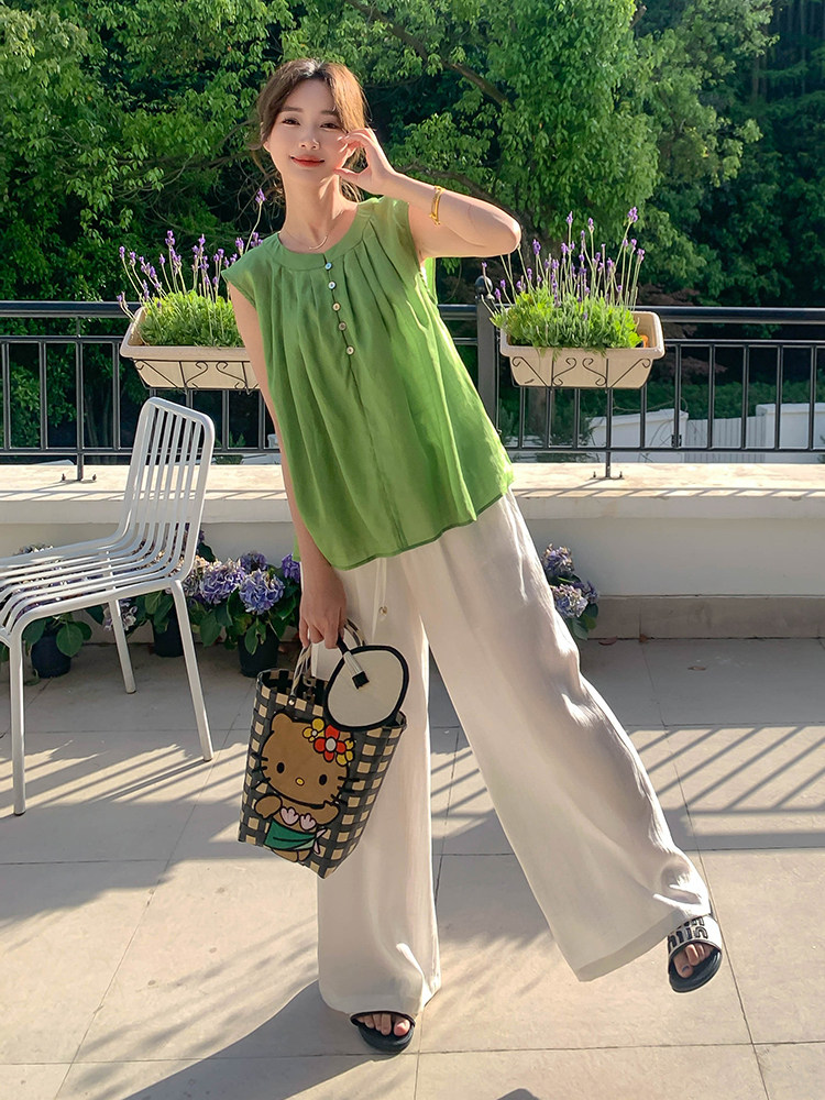 法式挂脖时尚女2025夏季新款设计感度假洋气无袖娃娃衫，女装运动套装，浙宝285（原212）