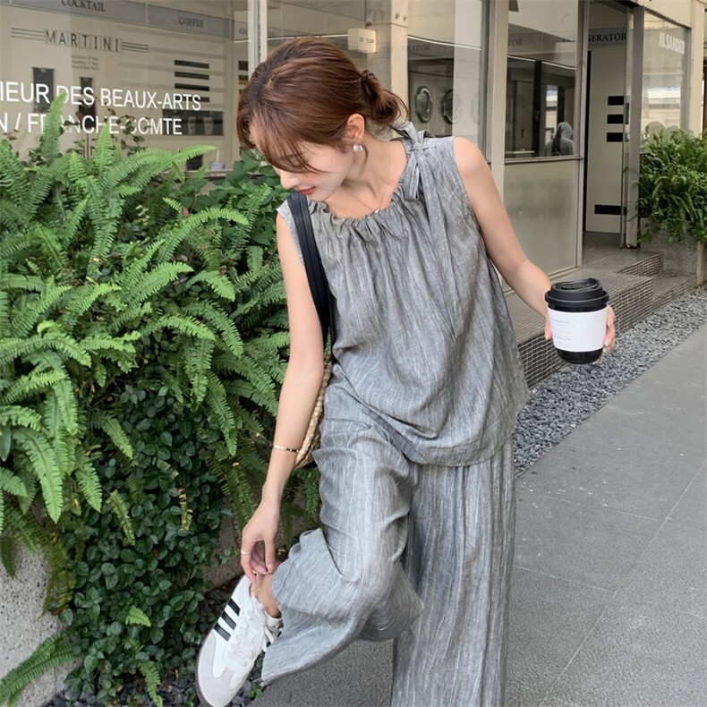 轻熟小众不撞款套装2025新款显瘦遮肚子清冷贵气感穿搭阔腿裤小衫图片