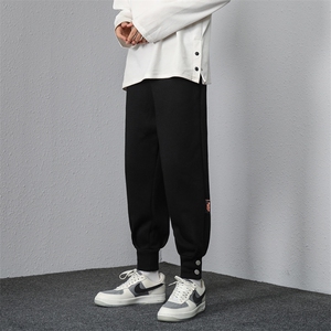 A018-KZ1129P50/春季贴标排扣纯色休闲大码运动裤束脚长裤男图片
