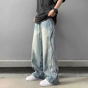 水洗做旧直筒解析设计纽扣牛仔裤男生宽松复古扎染阔腿抽绳微喇裤图片