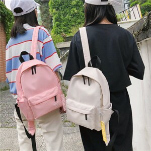 夏季新款时尚个性简约纯色少女双肩包尼龙防水书包,浅灰色大衣潮流搭配男图片