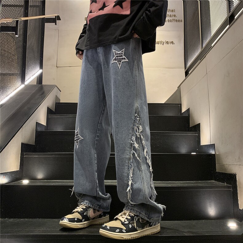 D258 KZ07 P65 控78 高街设计感五角星刺绣毛边牛仔裤图片