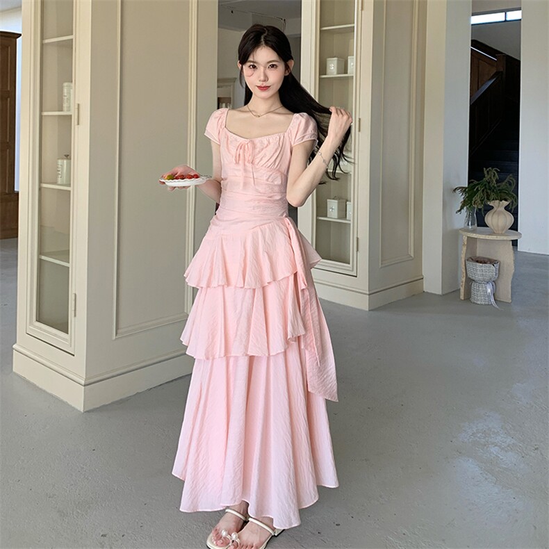 少女风粉色不规则泡泡袖连衣裙女夏2025新款多巴胺高级感百褶长裙图片