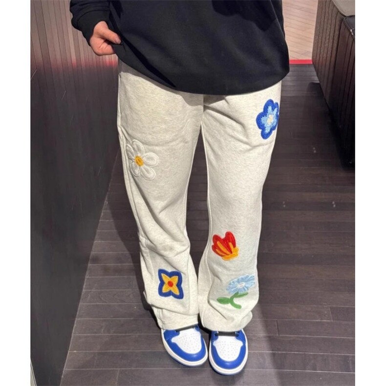 715-1K25003春季新款韩版学院风情侣花朵休闲裤男女运动卫裤P45，男装休闲裤，星座715-1