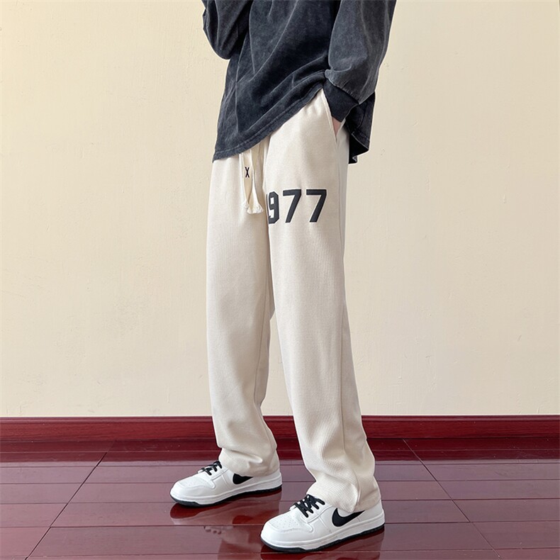 109-1-K97-P38 控48 华夫格发泡印花秋装宽松拖地休闲裤图片