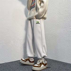 港风华夫格子休闲束脚裤春装新款松紧腰卫裤D201-DM78-P50图片