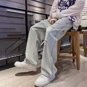 新款时尚潮男百搭宽松破洞牛仔裤图片