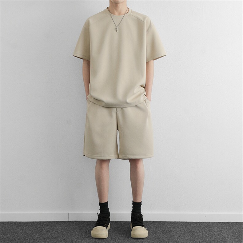 夏季纯色休闲运动套装潮流简约宽松情侣款短袖短裤两件套图片