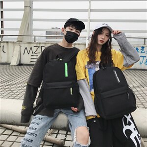 风范字母双肩背包时尚旅行背包开学季男女韩版书包图片