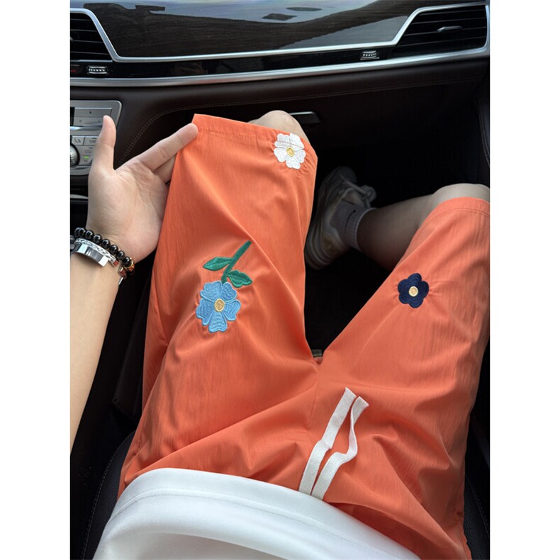 小花刺绣速干短裤男款夏季青少年冰丝裤子宽松沙滩出游穿搭五分裤图片