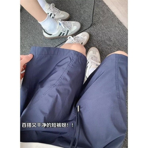 藏蓝色斜切速干短裤男款夏季美式篮球冰丝裤子过膝休闲运动五分裤图片