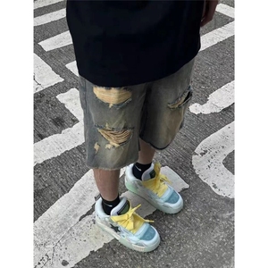 美式街头破洞牛仔短裤男夏季水洗做旧vintage裤子设计毛边五分裤图片