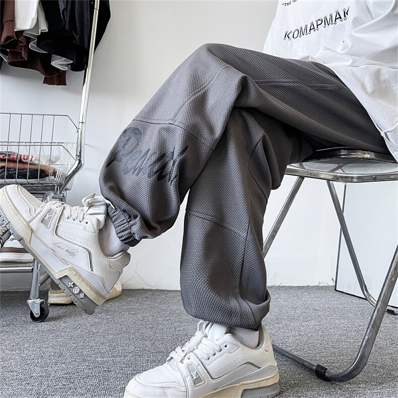 K123/P45春装新款现货男生休闲裤男个性印花宽松大码束脚运动裤，女装休闲裤，电商基地A050