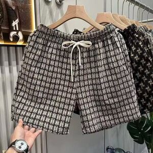 潮牌黑白格子休闲短裤男2025夏季新款宽松沙滩裤复古运动四分中裤图片