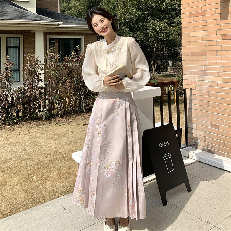 新中式国风马面裙套装女2025春秋季新款流行气质上衣半身裙两件套图片