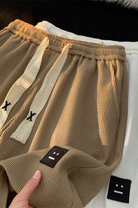 2025夏季新款华夫格笑脸标短裤大码M~5XL XZ604-DK601-P25控38图片