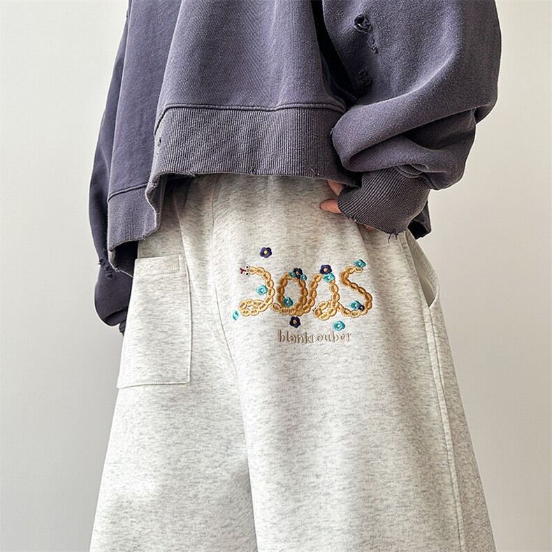 A408-24K42116-P65-X89-S-2XL 春节蛇年主推款刺绣休闲卫裤图片
