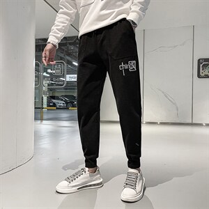休闲裤男秋冬季红同款哈伦裤韩版潮流刺绣束脚长裤子，男装休闲裤，电商A327