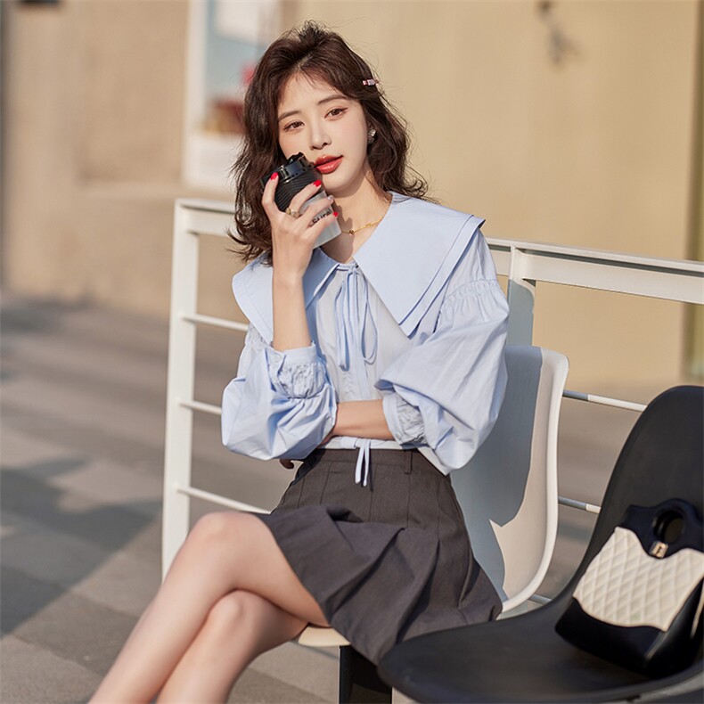 现货蓝色娃娃领长袖衬衫女复古设计感小众春季2024新款宽松衬衣,女装衬衫,梦懿尔