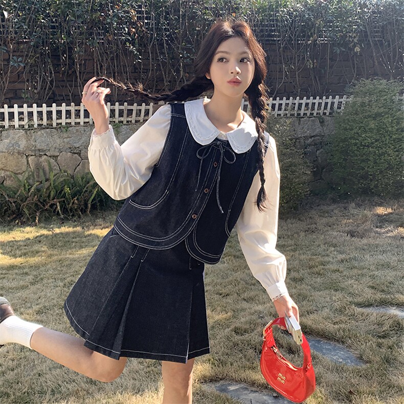 复古学院风蓝色牛仔套装女2025秋季设计感显瘦马甲A字短裙两件套图片