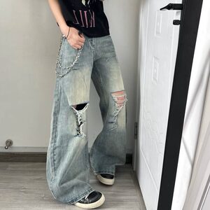 网络图 夏季新款破洞水洗做旧蓝牛仔裤男女直筒宽松阔腿长裤图片