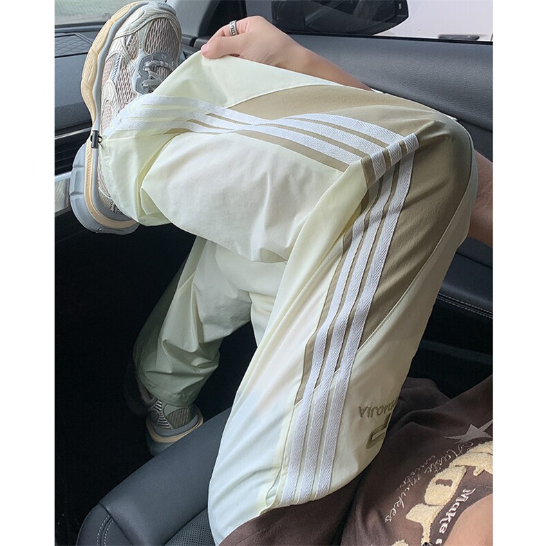 特批P33无差价25夏冰丝三条杠拖地裤潮牌大码束脚阔腿裤男K1436图片