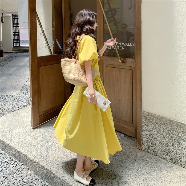 法式黄色度假风连衣裙女2025夏季新款高级感宽松V领泡泡袖长裙,女装连衣裙,2C081