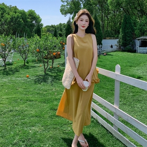 黄色度假浪漫风套装裙女2025夏季甜美气质木耳边背心半身裙两件套图片