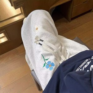 立体小花刺绣直筒宽松水洗牛仔裤男女美式复古情侣设计感阔腿长裤图片