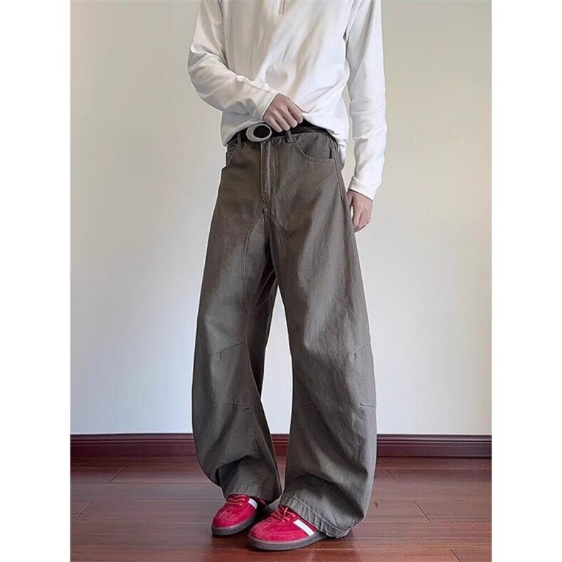 W9275-P58 网图现货 春季新款设计感美式复古廓形弯刀牛仔裤解构图片