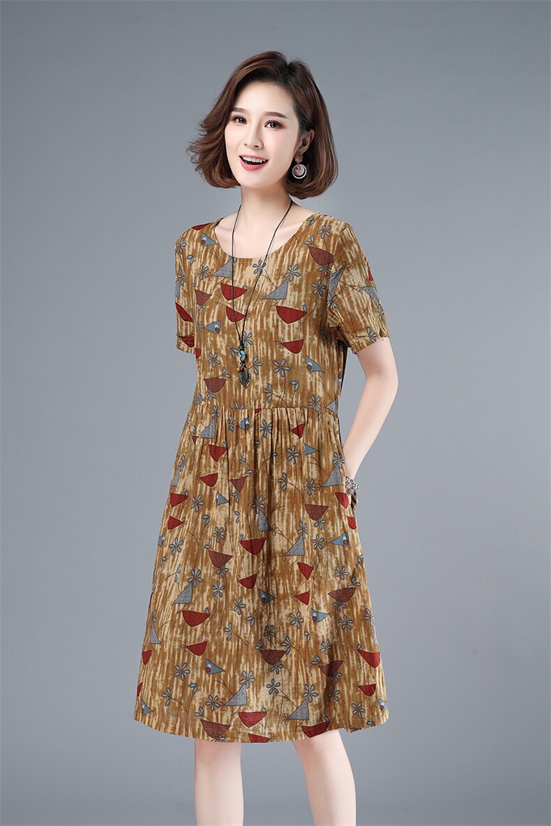 2021年夏季通勤韩版中长款a字裙40-49周岁碎花圆领套头短袖裙子,女装连衣裙,伊满意