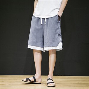 2025夏季新款风拼接仙鹤印花面料休闲短裤绿色DK95-P50,男装牛仔裤,电商B277A（原A068）